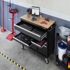 Husky 52 In W X 24.5 In. D Standard Duty 9-Drawer Workbench With 290-Piece Mechanics Tool Set In EVA Trays In Gloss Black -Husky Shop gloss black with silver trim husky mobile workbenches hotc5209b12mcmb fa 1000