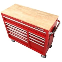 Husky 42 In. W X 18.1 In. D Standard Duty 10-Drawer Mobile Workbench Tool Chest With Solid Wood Top In Gloss Red 23 Husky 42 In. W X 18.1 In. D Standard Duty 10-Drawer Mobile Workbench Tool Chest With Solid Wood Top In Gloss Red -Husky Shop gloss red with silver finishes husky mobile workbenches h42mwc10r tl 44 1000