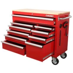 Husky 42 In. W X 18.1 In. D Standard Duty 10-Drawer Mobile Workbench Tool Chest With Solid Wood Top In Gloss Red 19 Husky 42 In. W X 18.1 In. D Standard Duty 10-Drawer Mobile Workbench Tool Chest With Solid Wood Top In Gloss Red -Husky Shop gloss red with silver finishes husky mobile workbenches h42mwc10r tl 77 1000