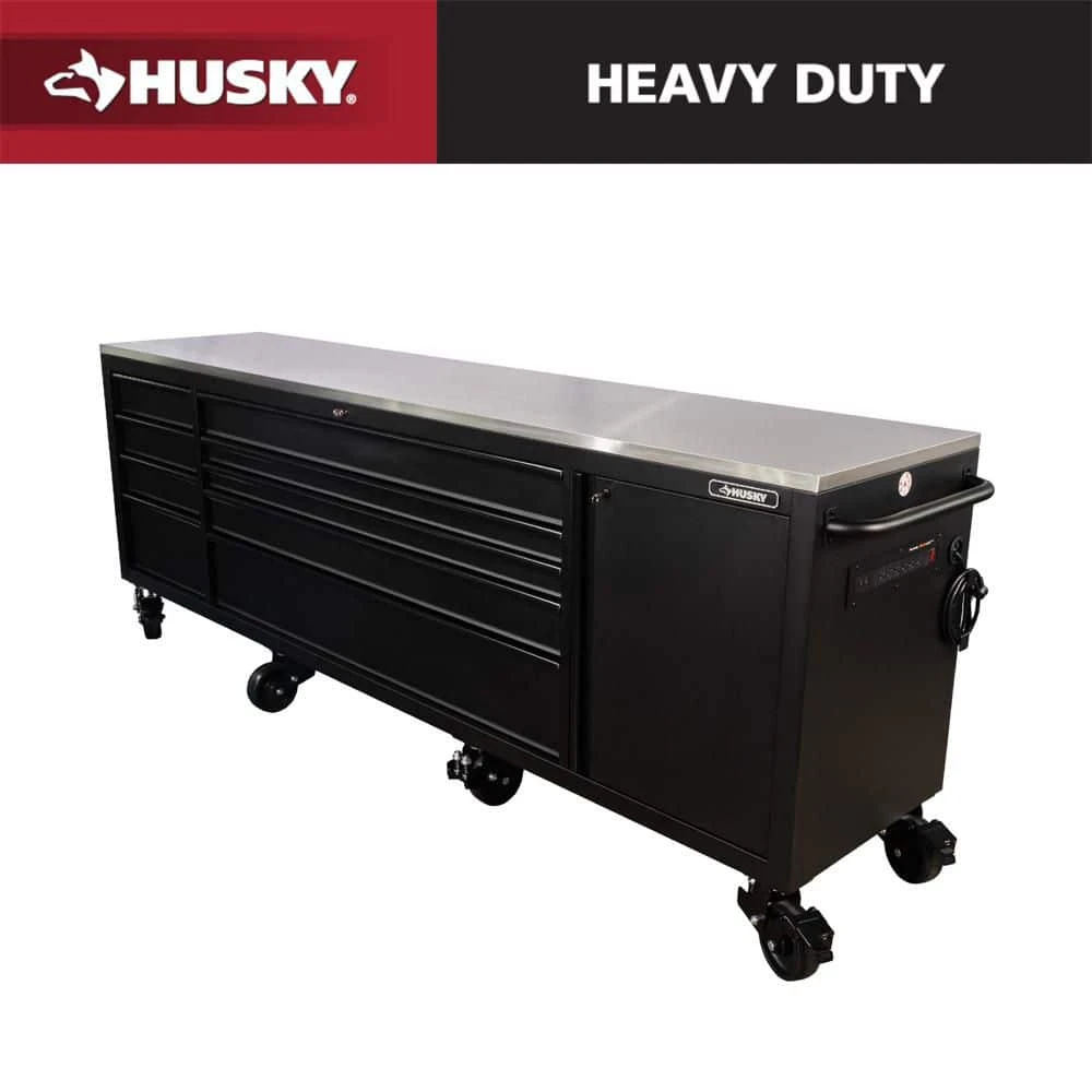 Husky 108 In. W X 24 In. D 9-Drawer Heavy-Duty Mobile Workbench With Stainless Steel Top In Matte Black 1 Husky 108 In. W X 24 In. D 9-Drawer Heavy-Duty Mobile Workbench With Stainless Steel Top In Matte Black