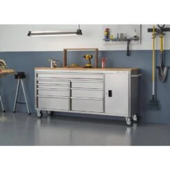 Husky 72 In. W X 18 In. D Heavy Duty 8-Drawer 1-Door Mobile Workbench Tool Chest With Solid Wood Top In Stainless Steel -Husky Shop stainless steel with silver trim husky mobile workbenches hyls 7208 31 1000